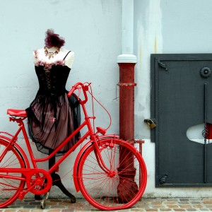Red bike and lady in black